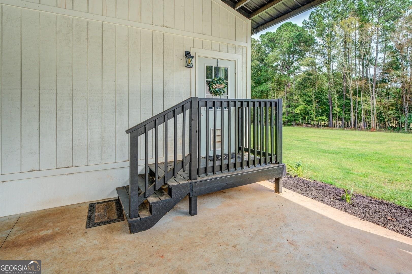 3060 Eatonton Road Madison, GA 30650 - Photo 57 of 65 a view of a porch with a yard