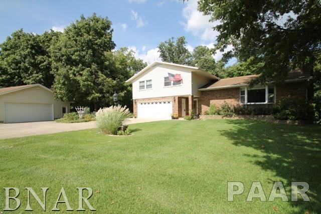 25982 Longview Road Hopedale, IL 61747 - Photo 1 of 30 a view of a white house with a big yard and large tree