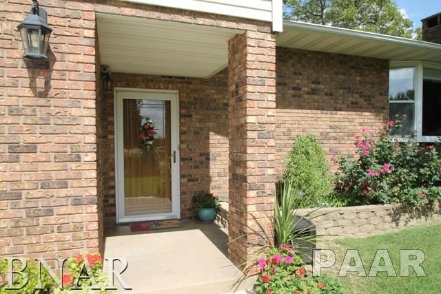 25982 Longview Road Hopedale, IL 61747 - Photo 2 of 30 a view of a door with a bench