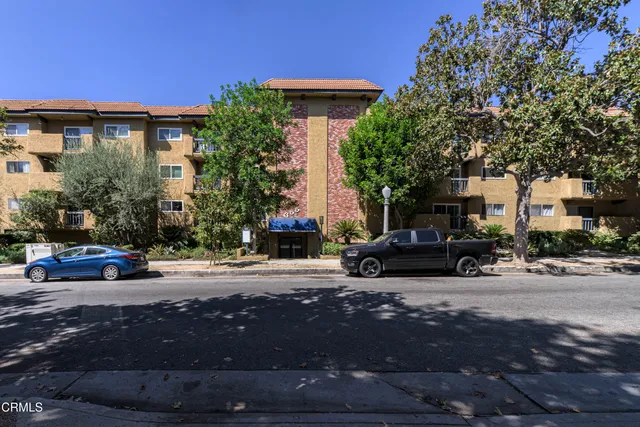 a car parked in front of a house