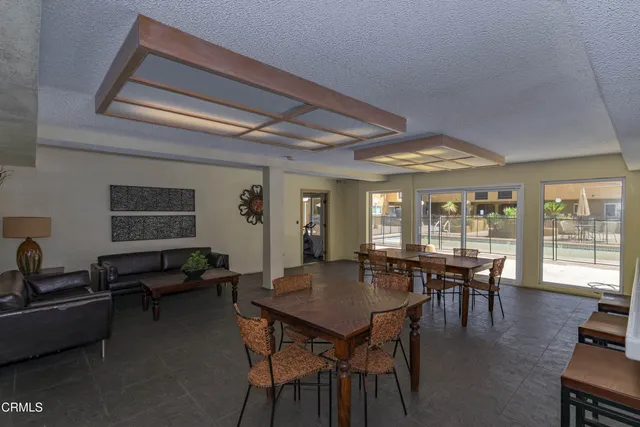 a utility room with two washing machine