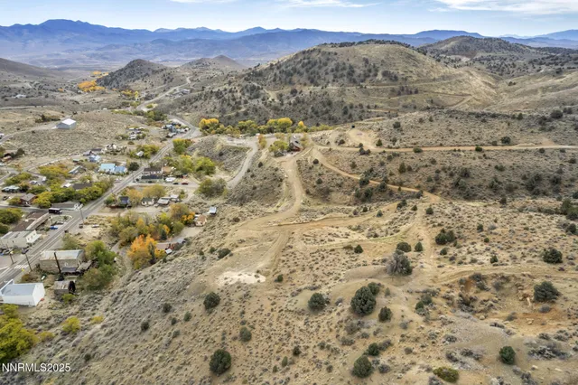 a view of mountains and valleys