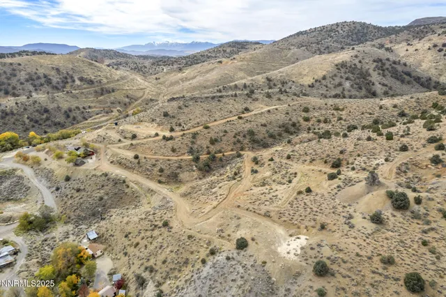 a view of a dry yard covered with snow in the ocean