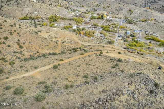 a view of a mountain with a mountain in the background