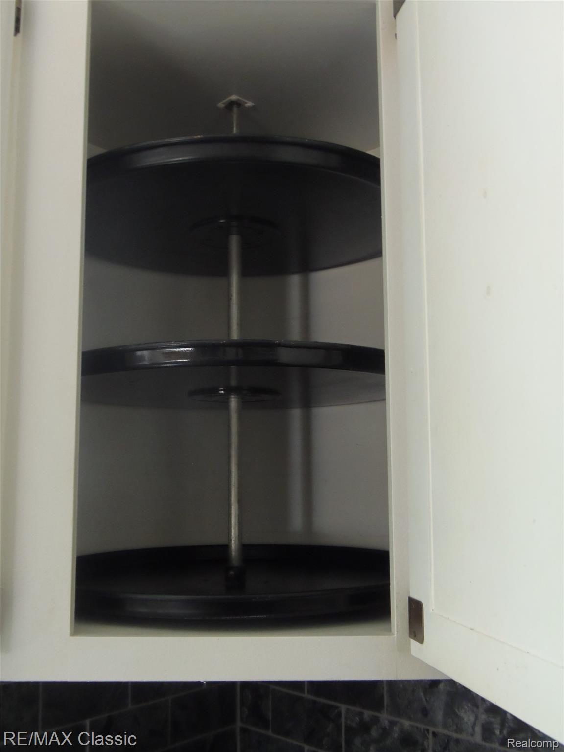 1190 Bangor Road Waterford, MI 48328 - Photo 20 of 44 Upper kit cabinets with lazy susan.jpg