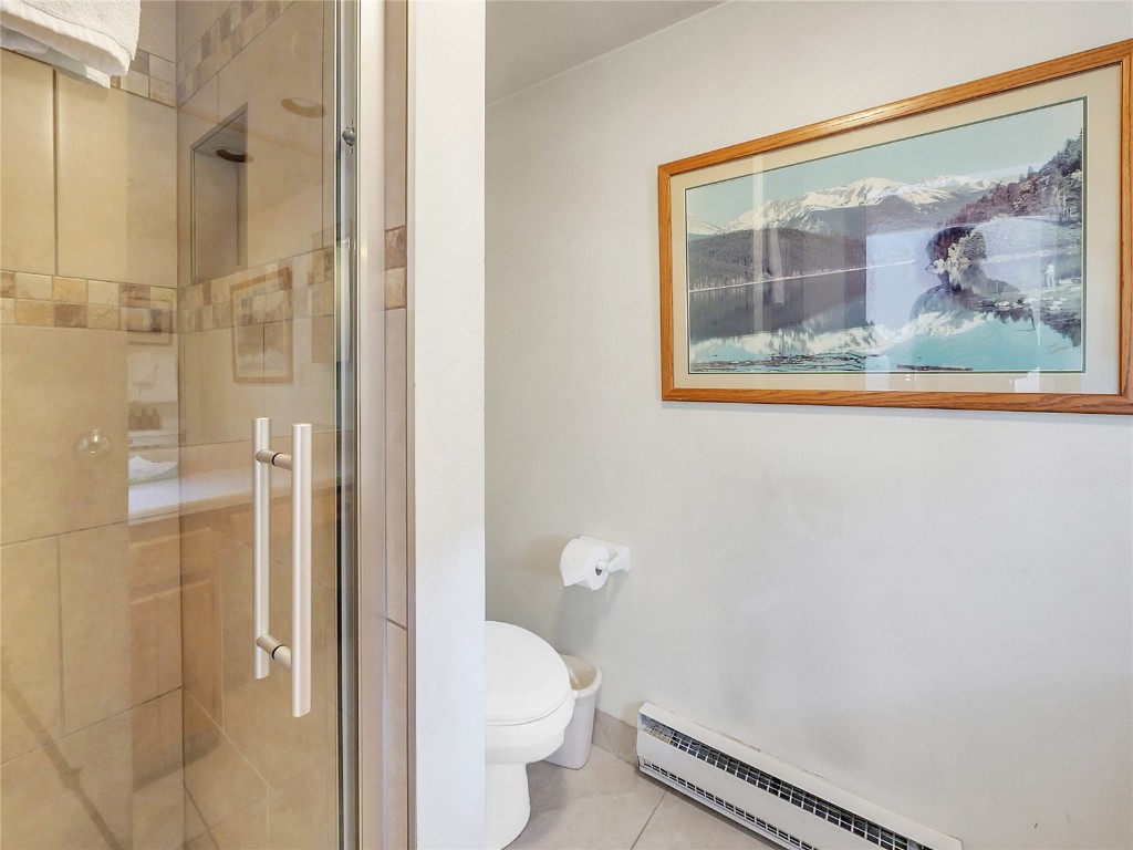 22280 Highway 6, Unit 1717 Keystone, CO 80435 - Photo 15 of 21 a bathroom with a toilet and a shower
