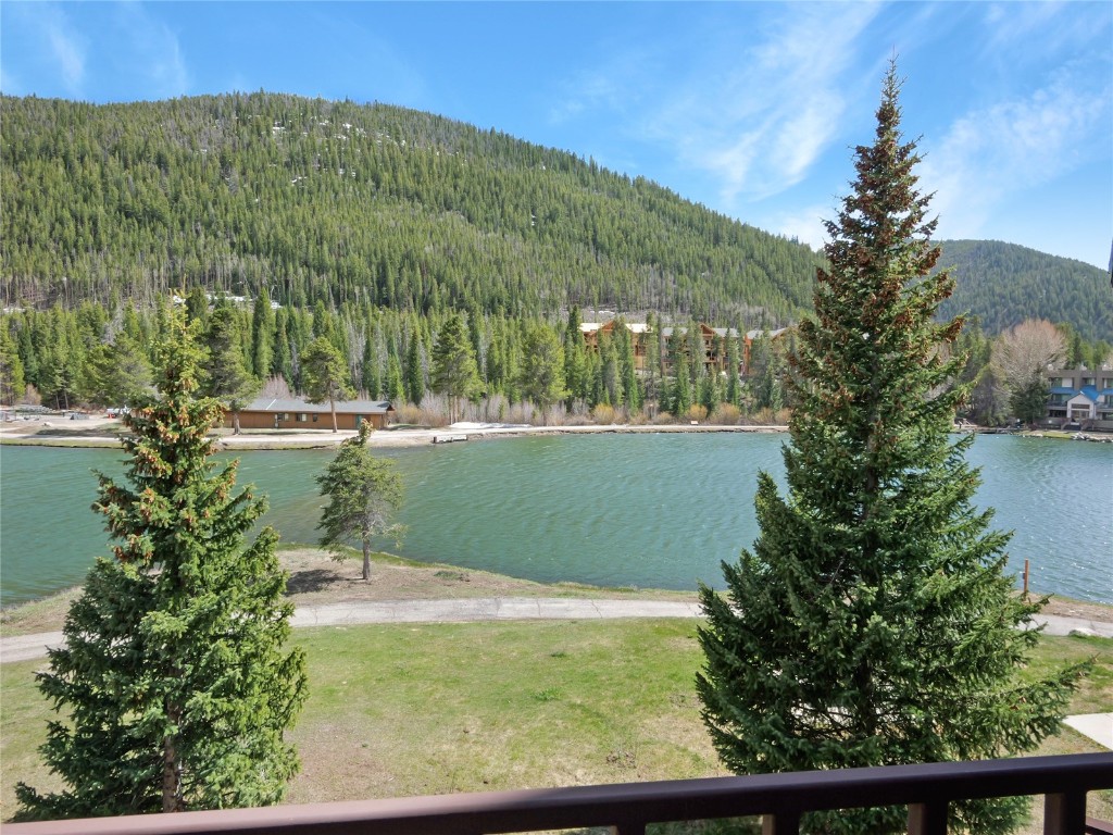 22280 Highway 6, Unit 1717 Keystone, CO 80435 - Photo 18 of 21 a view of a lake with a mountain in the background
