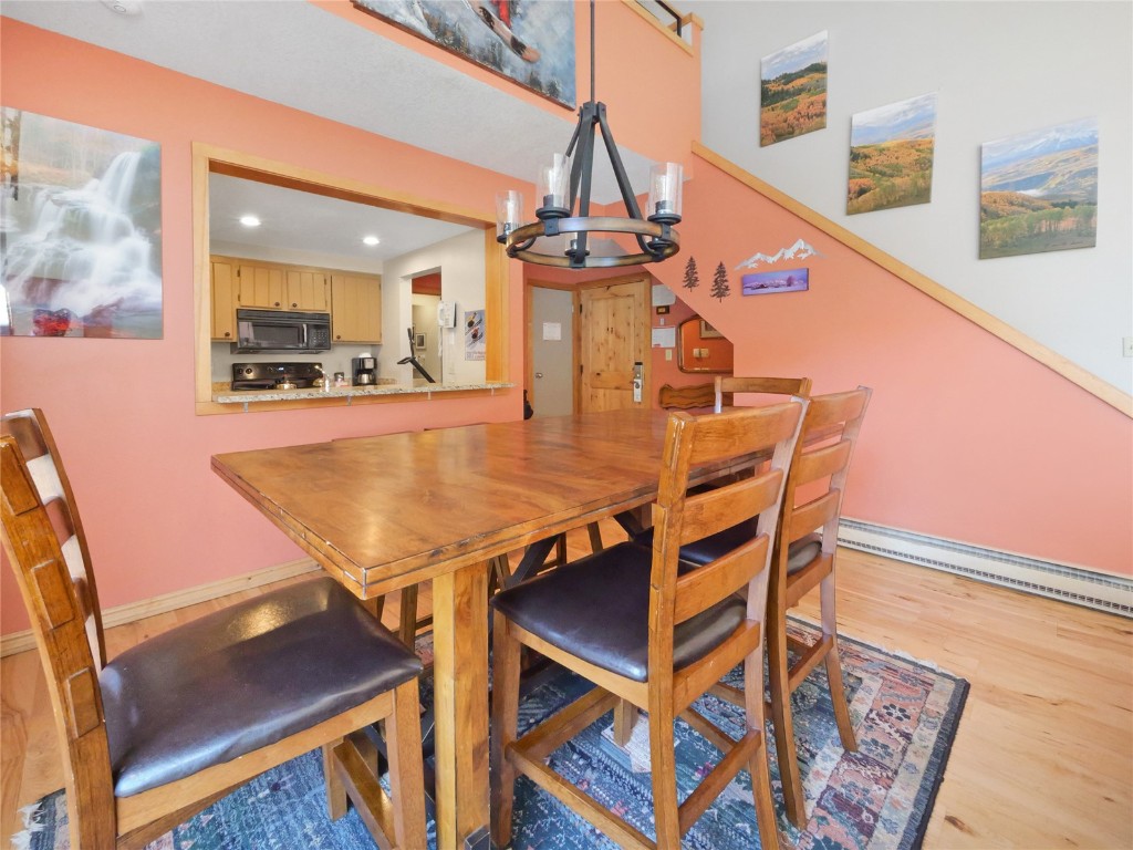 22280 Highway 6, Unit 1717 Keystone, CO 80435 - Photo 6 of 21 a dining room with furniture and window