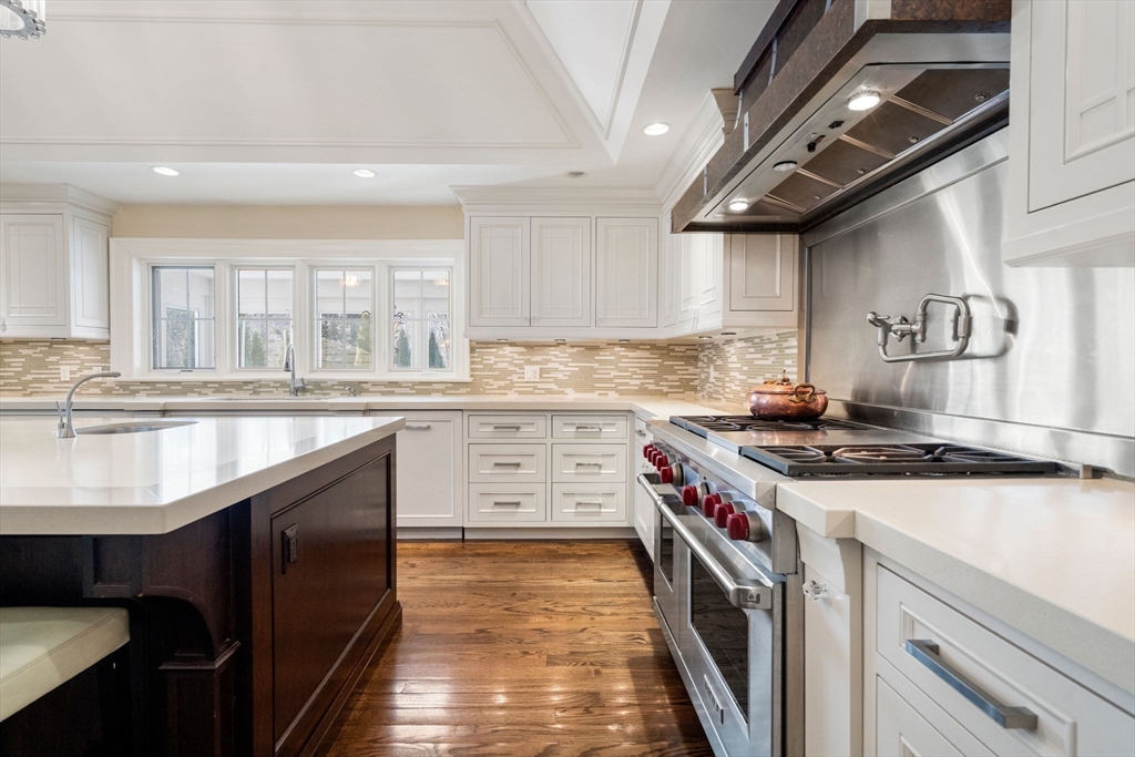 11 Hillcrest Road Weston, MA 02493 - Photo 11 of 42 a kitchen with a stove sink and cabinets