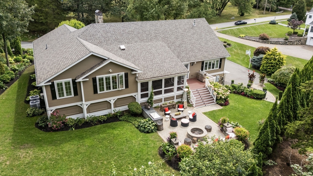11 Hillcrest Road Weston, MA 02493 - Photo 2 of 42 an aerial view of a house with garden