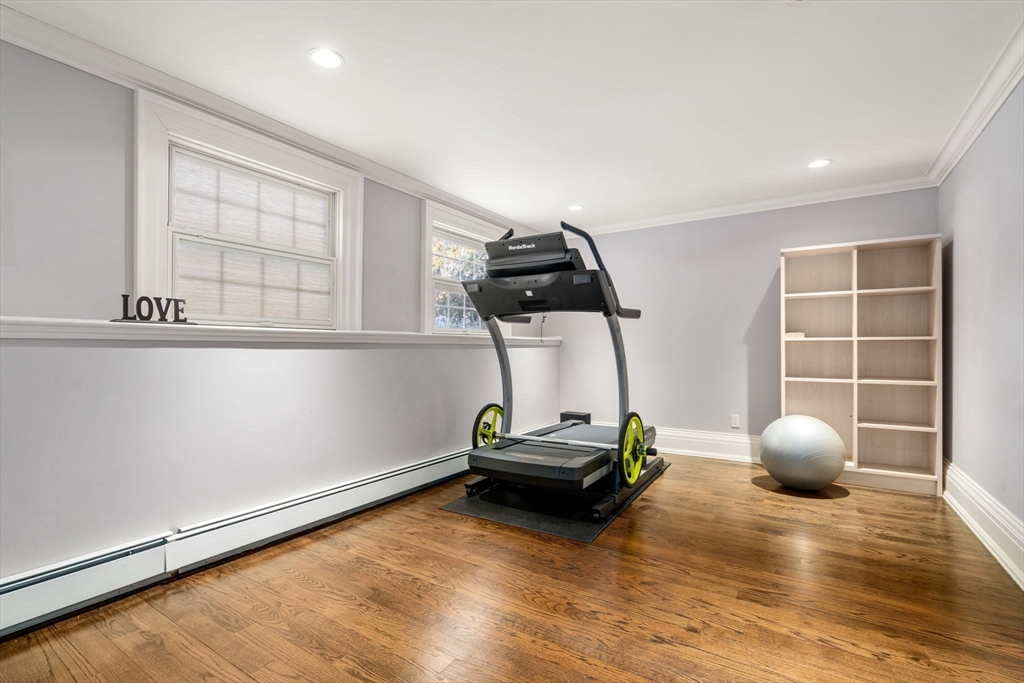 11 Hillcrest Road Weston, MA 02493 - Photo 32 of 42 a view of a room with gym equipment