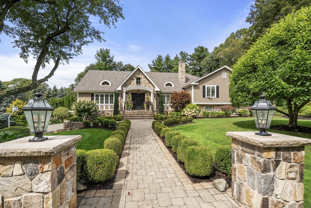 11 Hillcrest Road Weston, MA 02493 - Photo 42 of 42 a front view of a house with garden