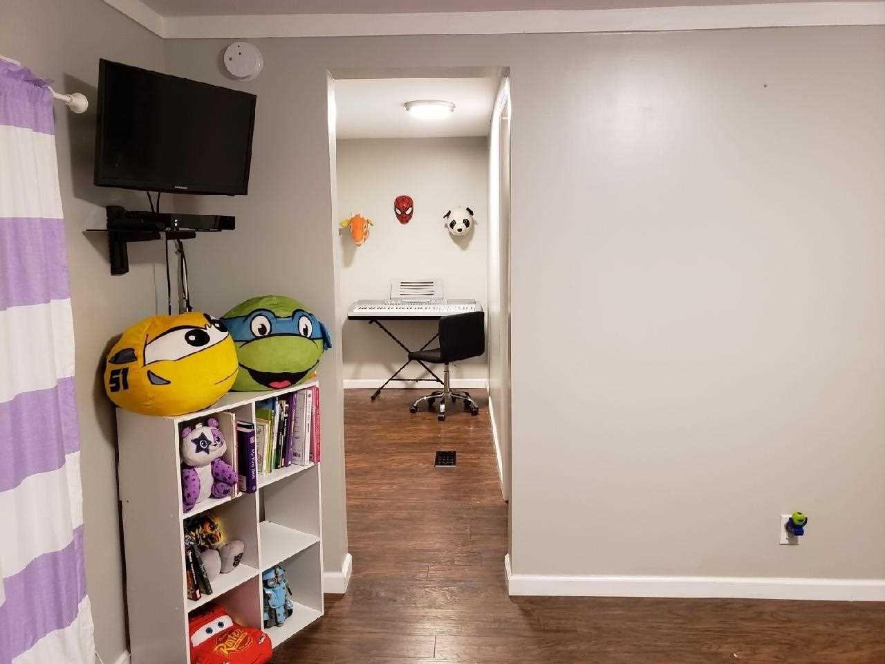 413 Cologne Avenue Wallkill, NY 12589 - Photo 12 of 22 a living room with furniture and a flat screen tv