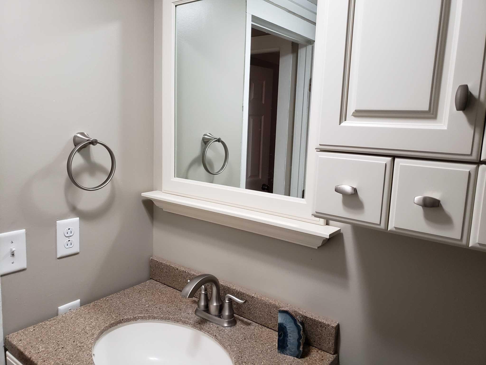 413 Cologne Avenue Wallkill, NY 12589 - Photo 14 of 22 a bathroom with a sink and a mirror