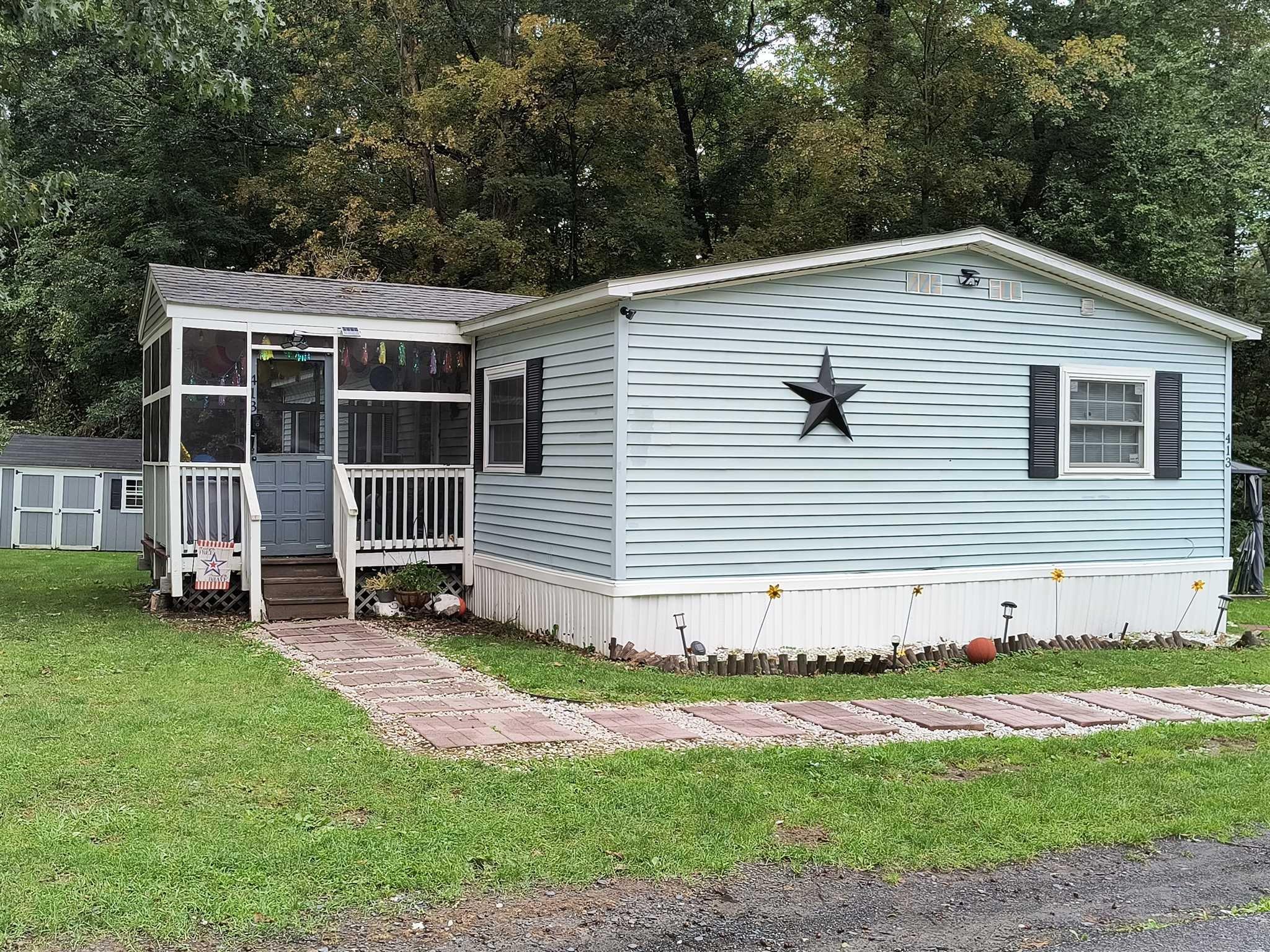 413 Cologne Avenue Wallkill, NY 12589 - Photo 18 of 22 a front view of a house with a yard