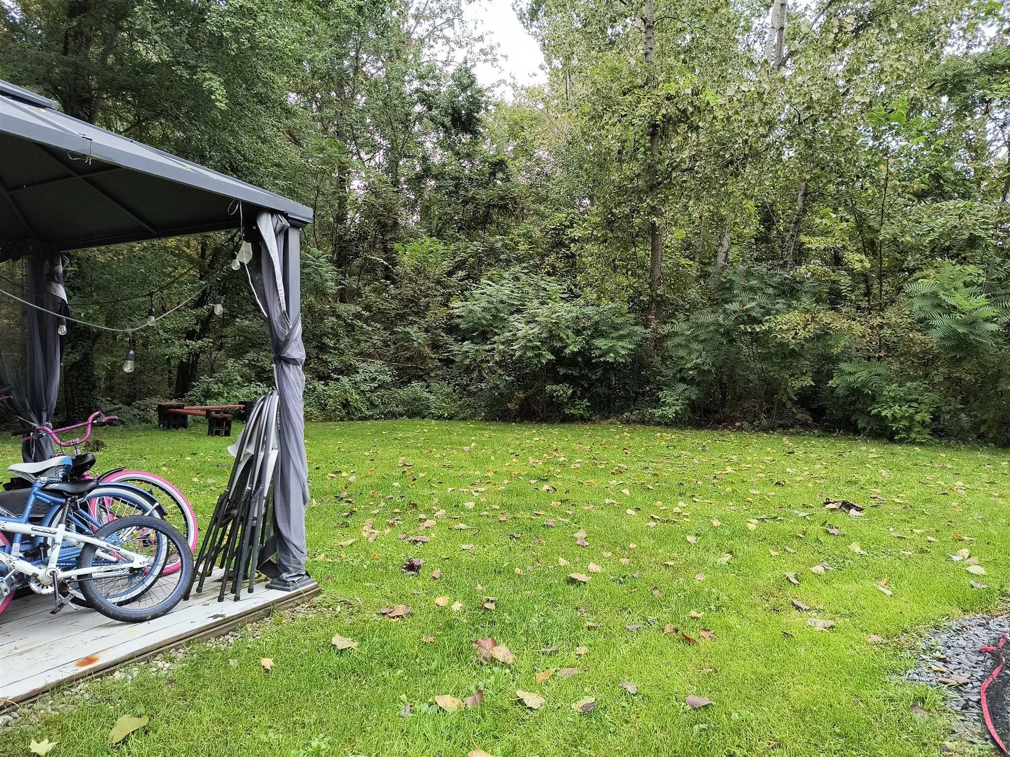 413 Cologne Avenue Wallkill, NY 12589 - Photo 19 of 22 a view of a wooden deck with a backyard