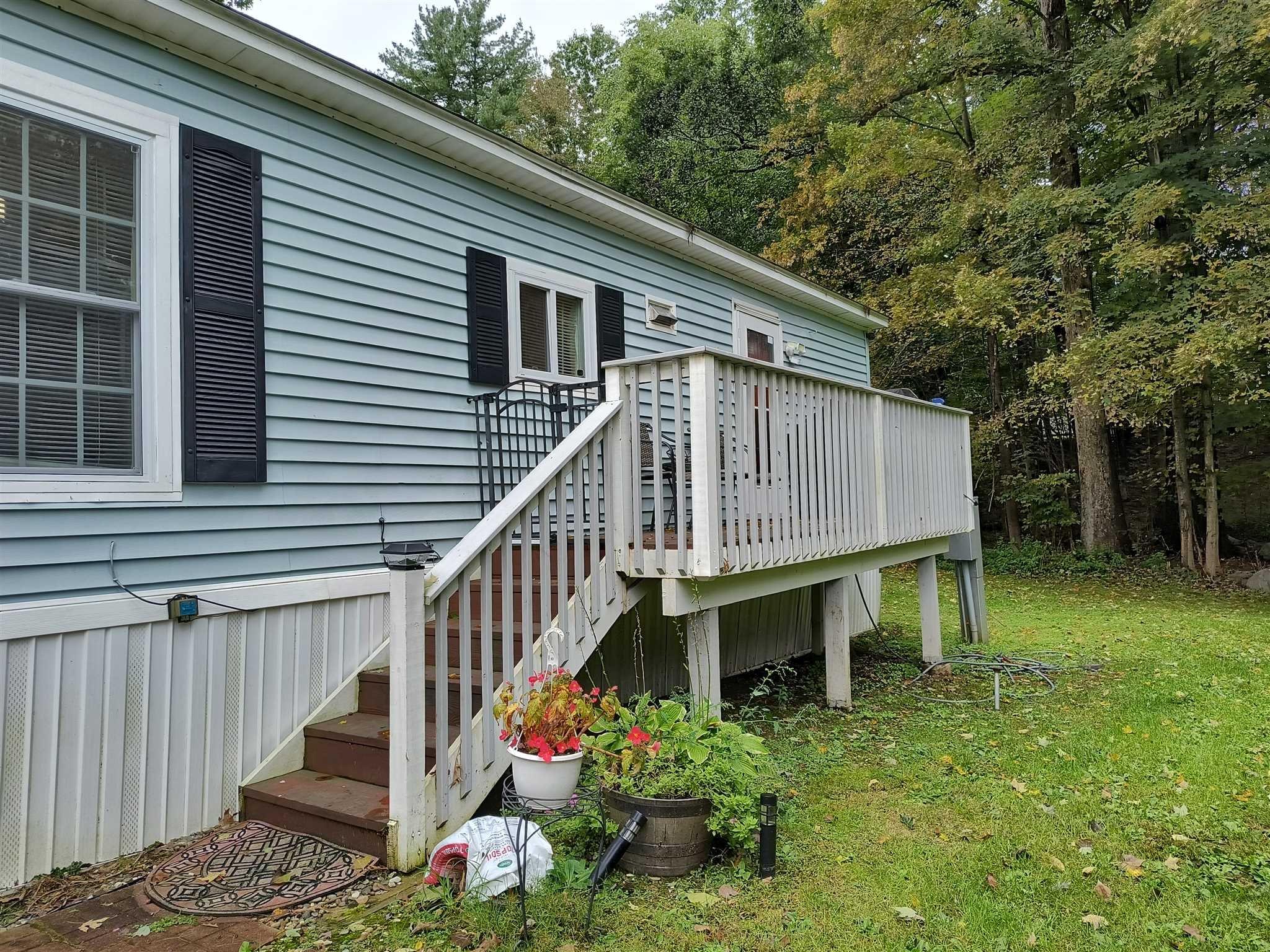 413 Cologne Avenue Wallkill, NY 12589 - Photo 2 of 22 a view of a house with pool and garden