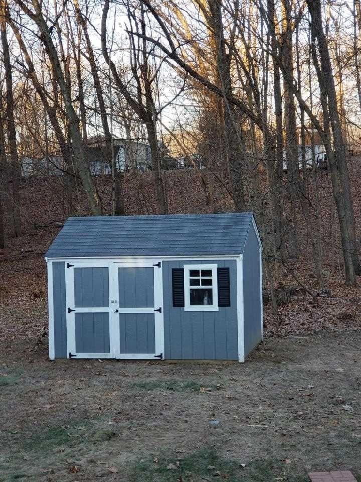 413 Cologne Avenue Wallkill, NY 12589 - Photo 21 of 22 a house that has tree in front of it