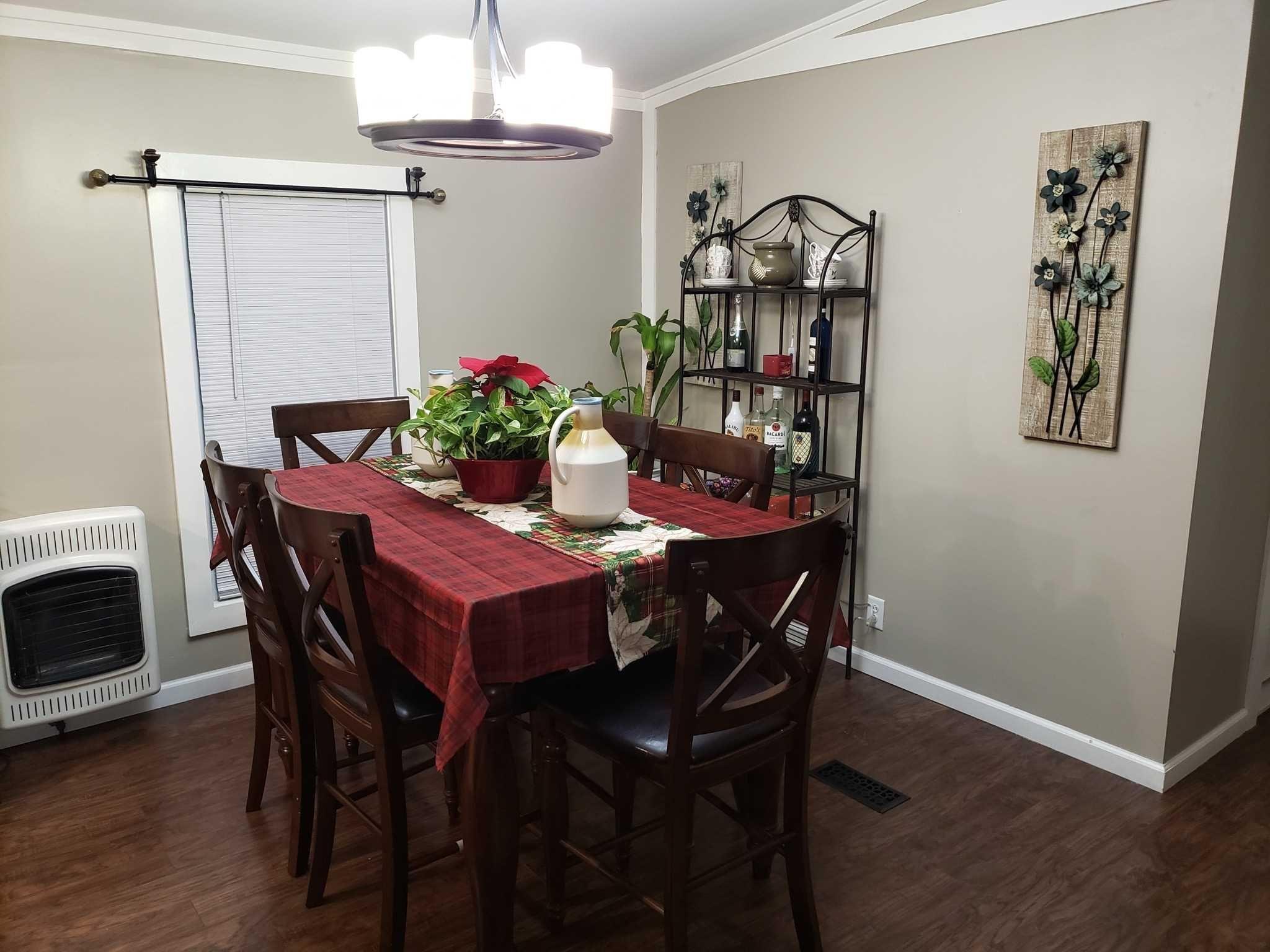 413 Cologne Avenue Wallkill, NY 12589 - Photo 9 of 22 a view of a dining room with furniture and wooden floor
