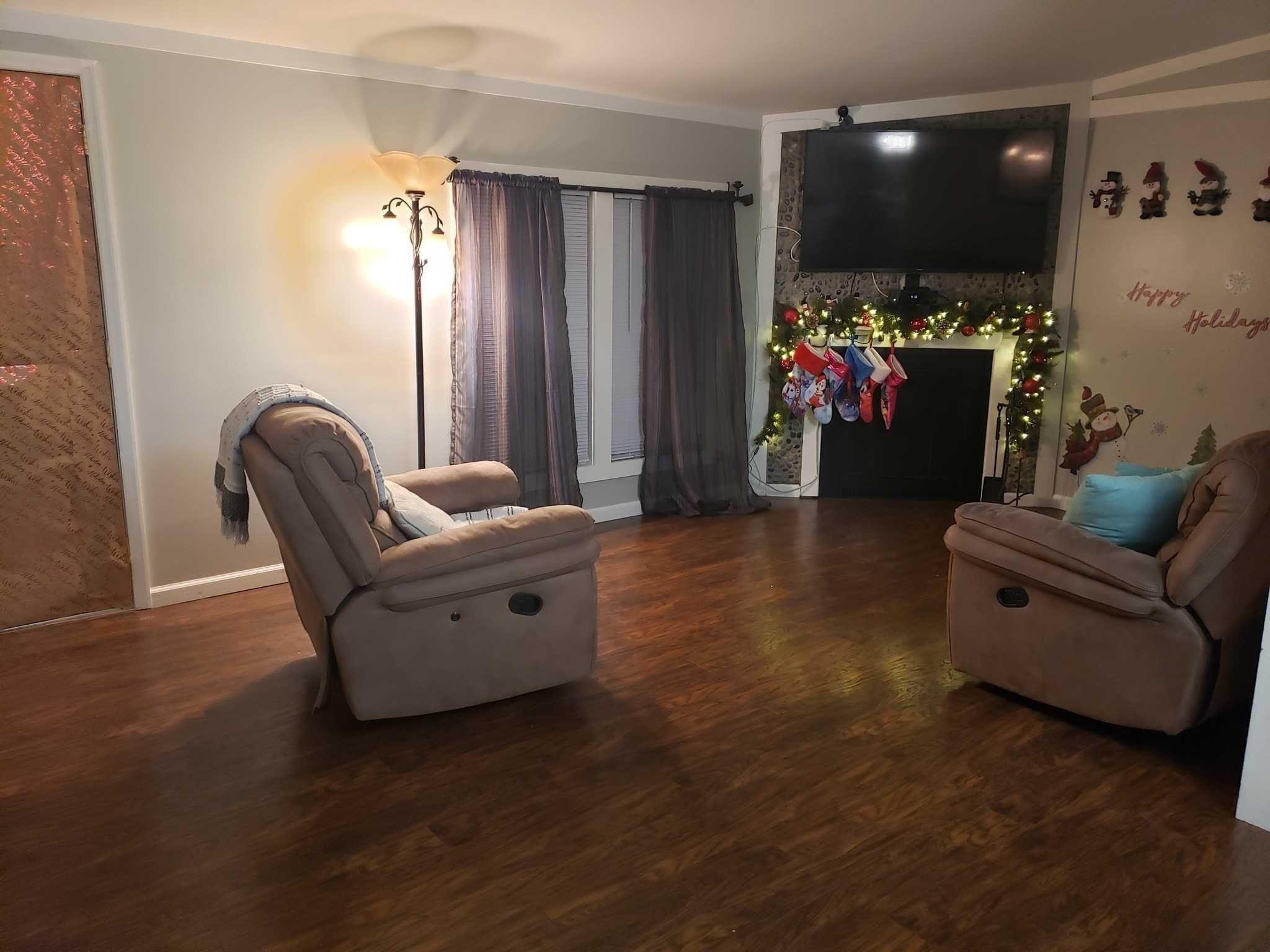 413 Cologne Avenue Wallkill, NY 12589 - Photo 10 of 22 a living room with furniture and a flat screen tv