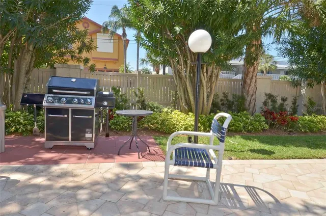 a view of a chairs and tables in the patio