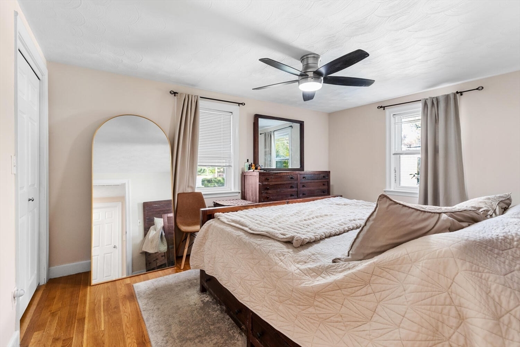 22 Wayland Road Wakefield, MA 01880 - Photo 18 of 28 a bedroom with a bed and a dresser