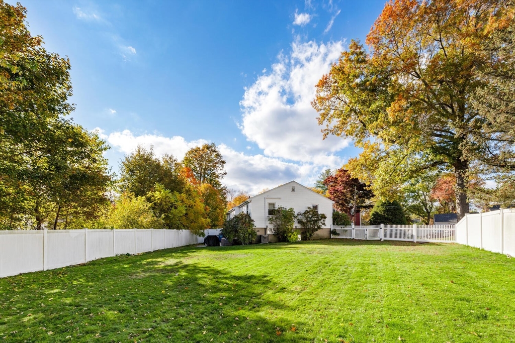 22 Wayland Road Wakefield, MA 01880 - Photo 27 of 28 a view of an outdoor space and basketball court