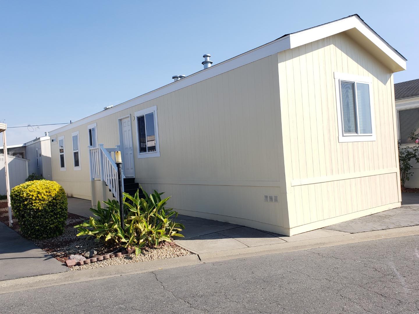 55 San Juan Grade Road, Unit 49 Salinas, CA 93906 - Photo 1 of 14 a front view of a house with plants