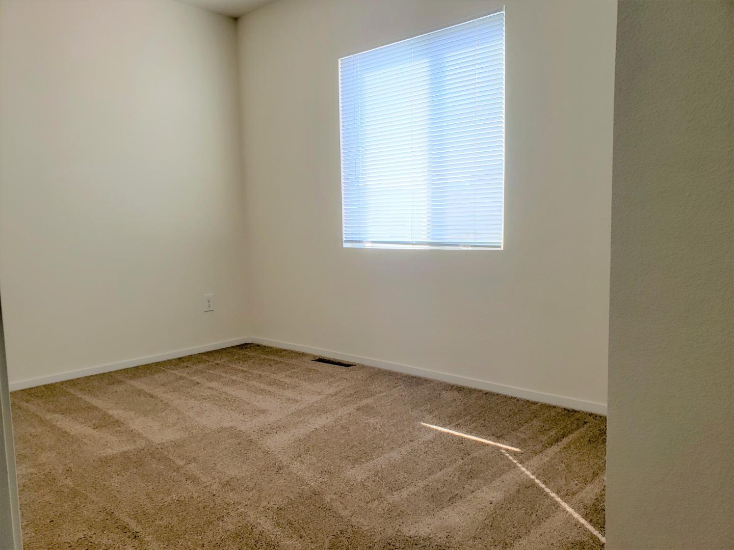 55 San Juan Grade Road, Unit 49 Salinas, CA 93906 - Photo 7 of 14 a view of a room that has a window in it