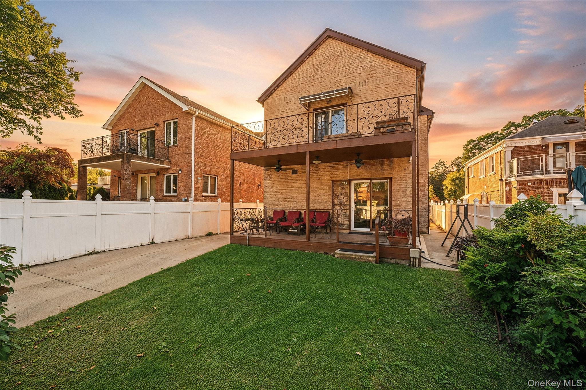 186-31 Radnor Road Queens, NY 11432 - Photo 11 of 11 a view of a house with a yard and plants