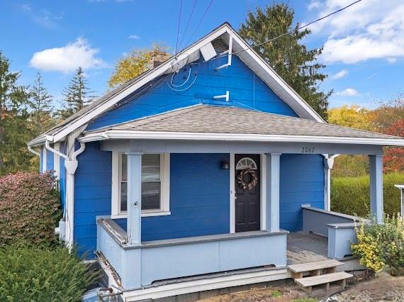 2067 Brodhead Road Aliquippa, PA 15001 - Photo 2 of 8 a front view of a house with garden