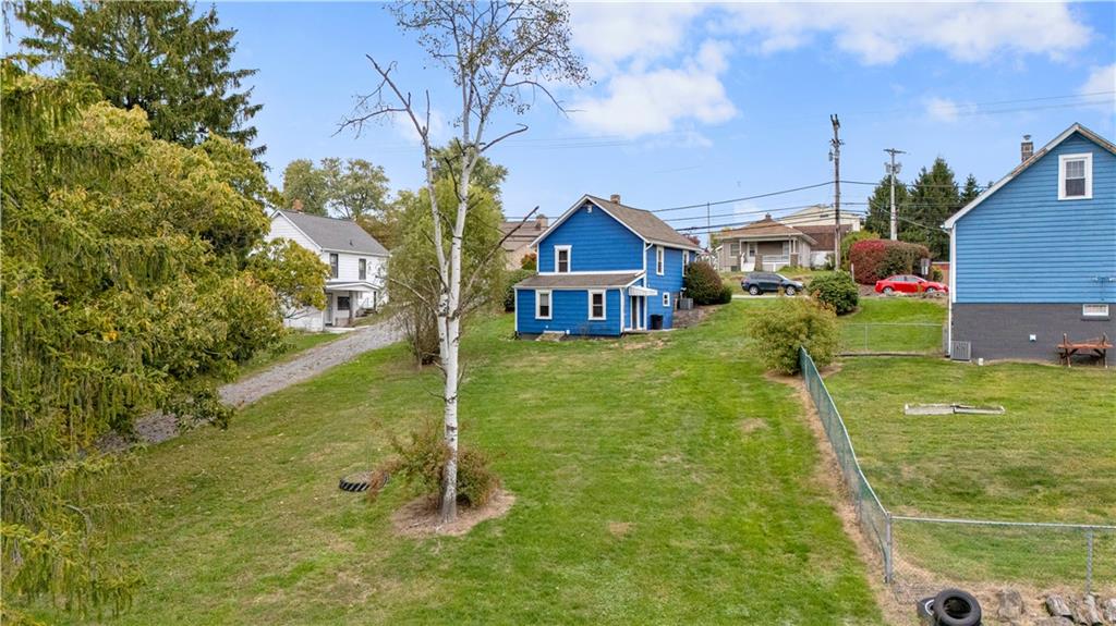 2067 Brodhead Road Aliquippa, PA 15001 - Photo 5 of 8 a house view with a garden space
