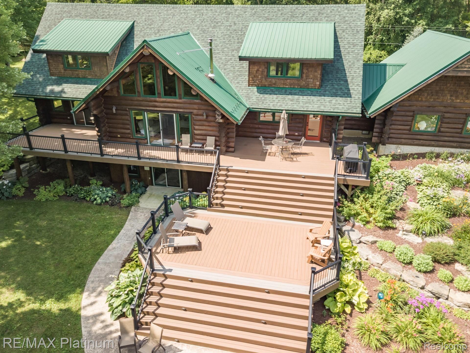 8335 Cedar Lake Road Pinckney, MI 48169 - Photo 44 of 55 Huge Deck Area!! You Can Have The Whole Gang Here!!!