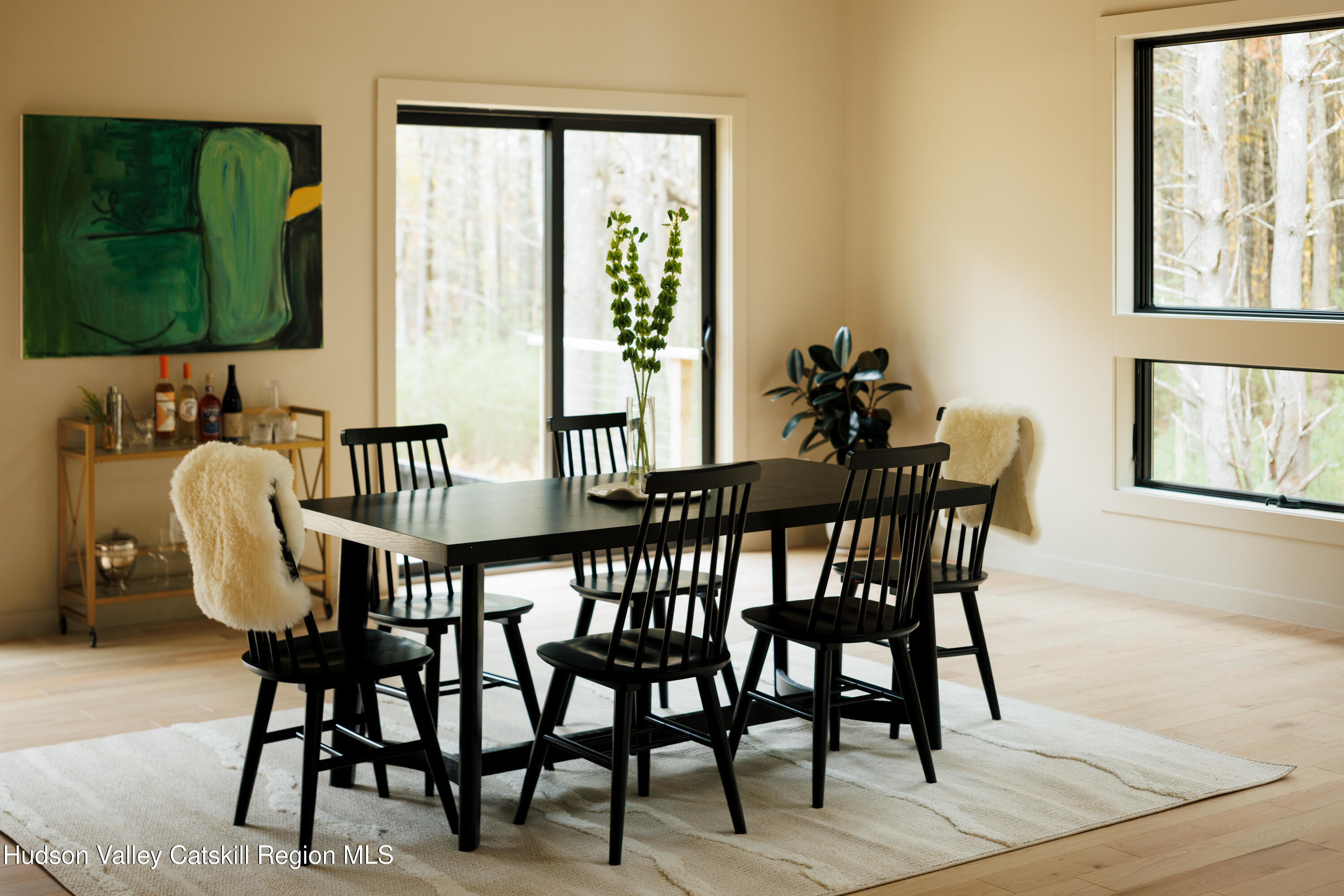 210 Dutchtown Road Saugerties, NY 12477 - Photo 11 of 26 a view of a dining room and livingroom with furniture window and wooden floor