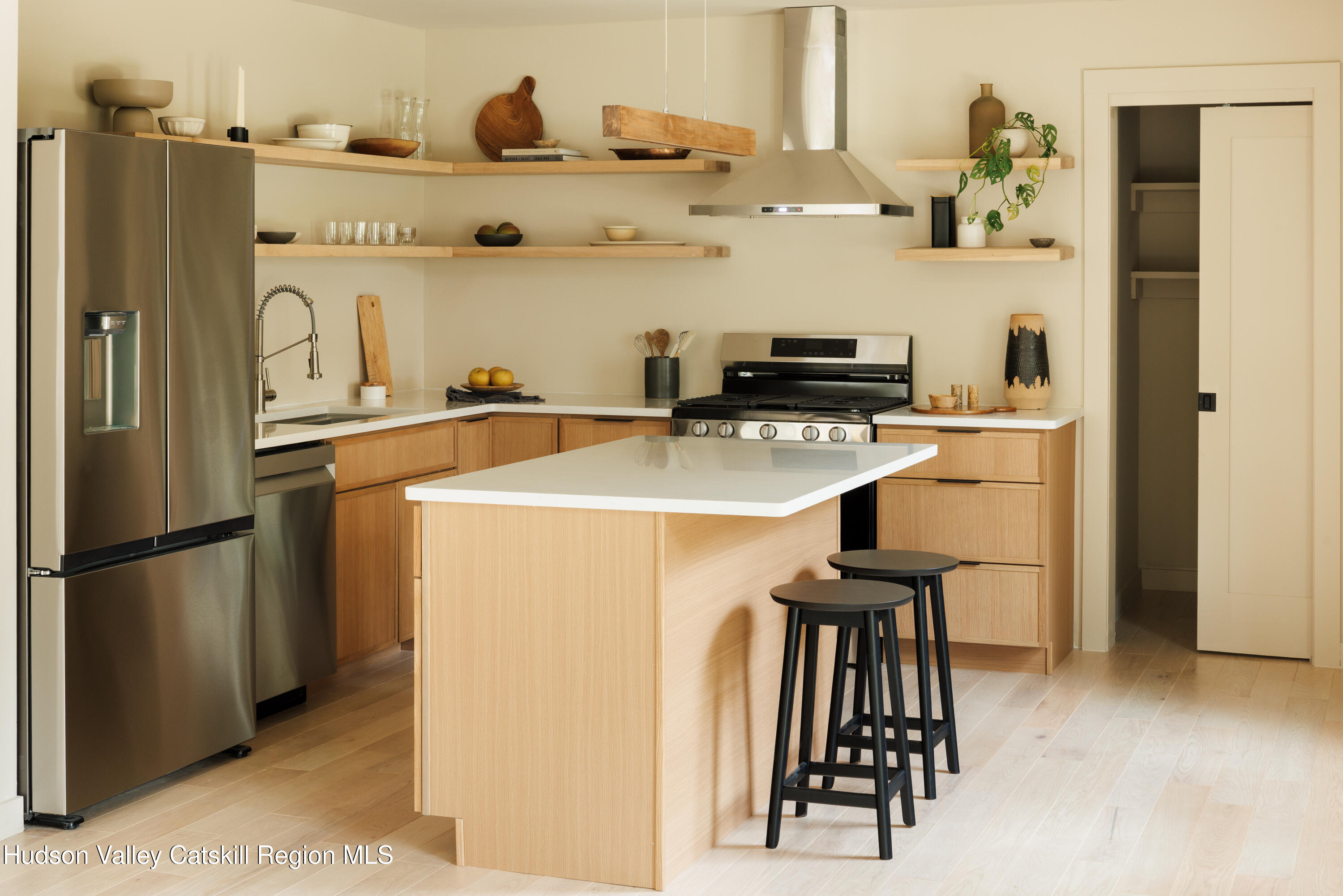 210 Dutchtown Road Saugerties, NY 12477 - Photo 15 of 26 a kitchen with stainless steel appliances a refrigerator and a stove