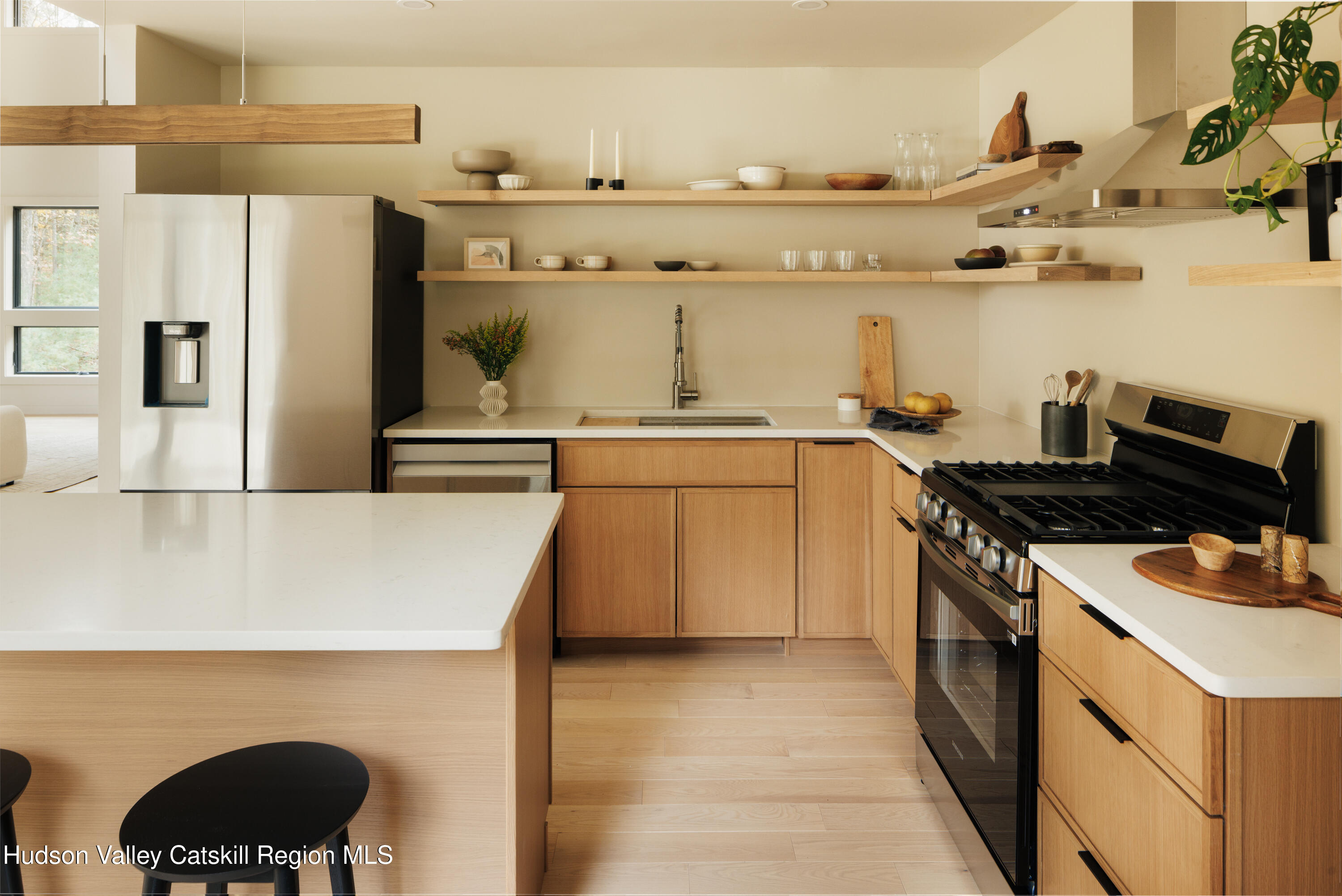 210 Dutchtown Road Saugerties, NY 12477 - Photo 16 of 26 a kitchen with a stove and a refrigerator