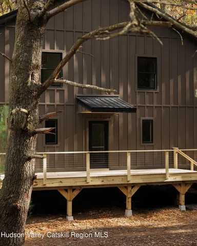a view of house with roof deck