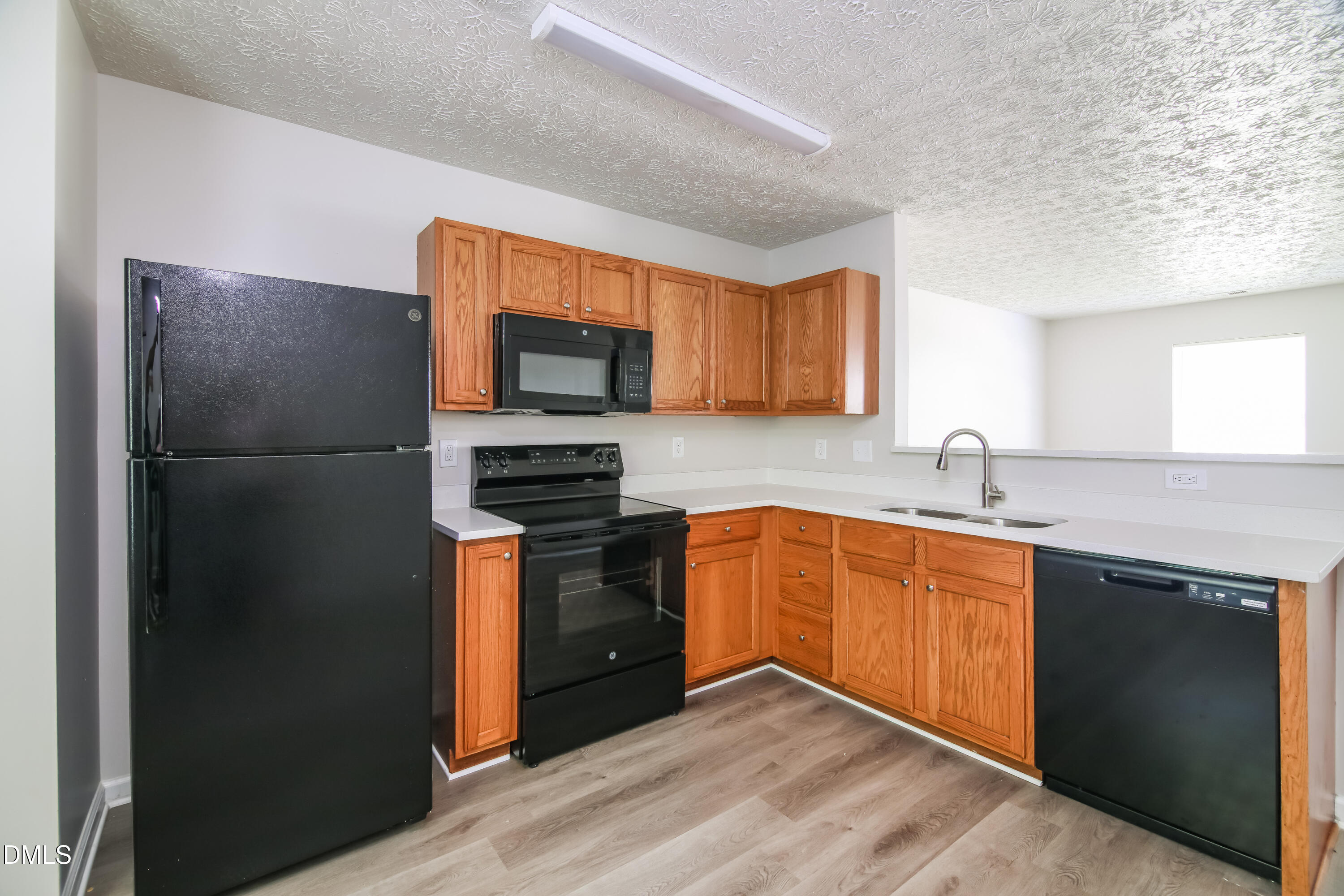 3137 Slippery Elm Drive Raleigh, NC 27610 - Photo 5 of 17 006-photo-kitchen-14583304