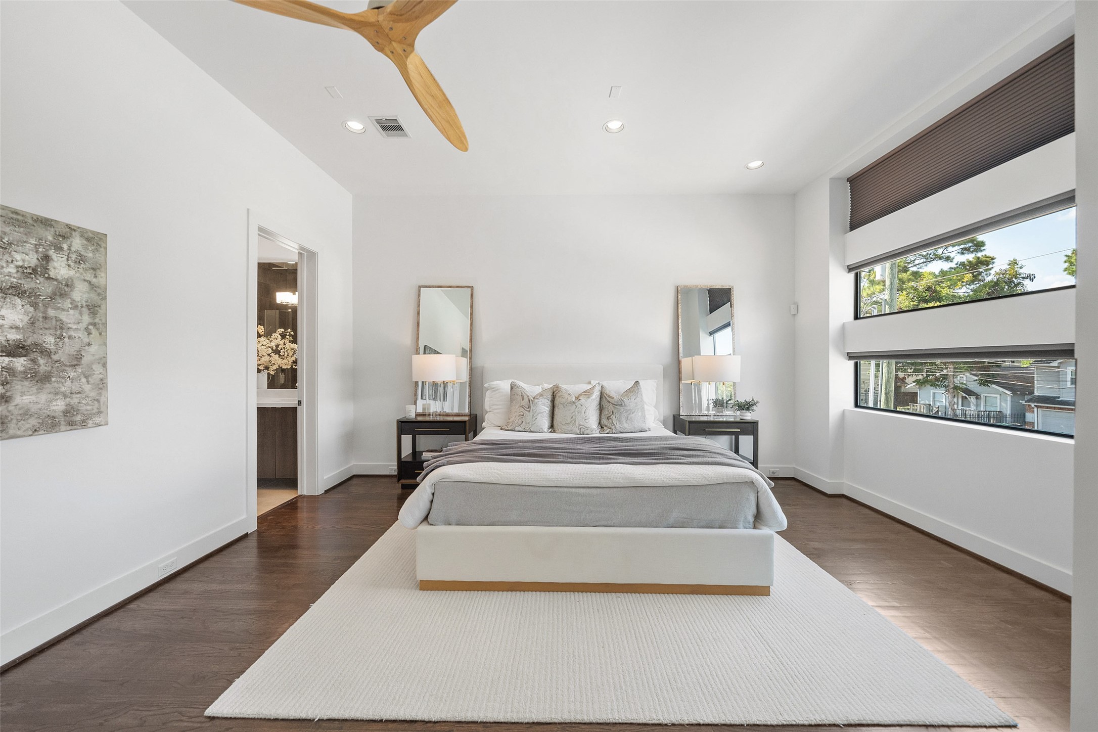 316 Birdsall Street Houston, TX 77007 - Photo 15 of 30 a spacious bedroom with a large bed and a window