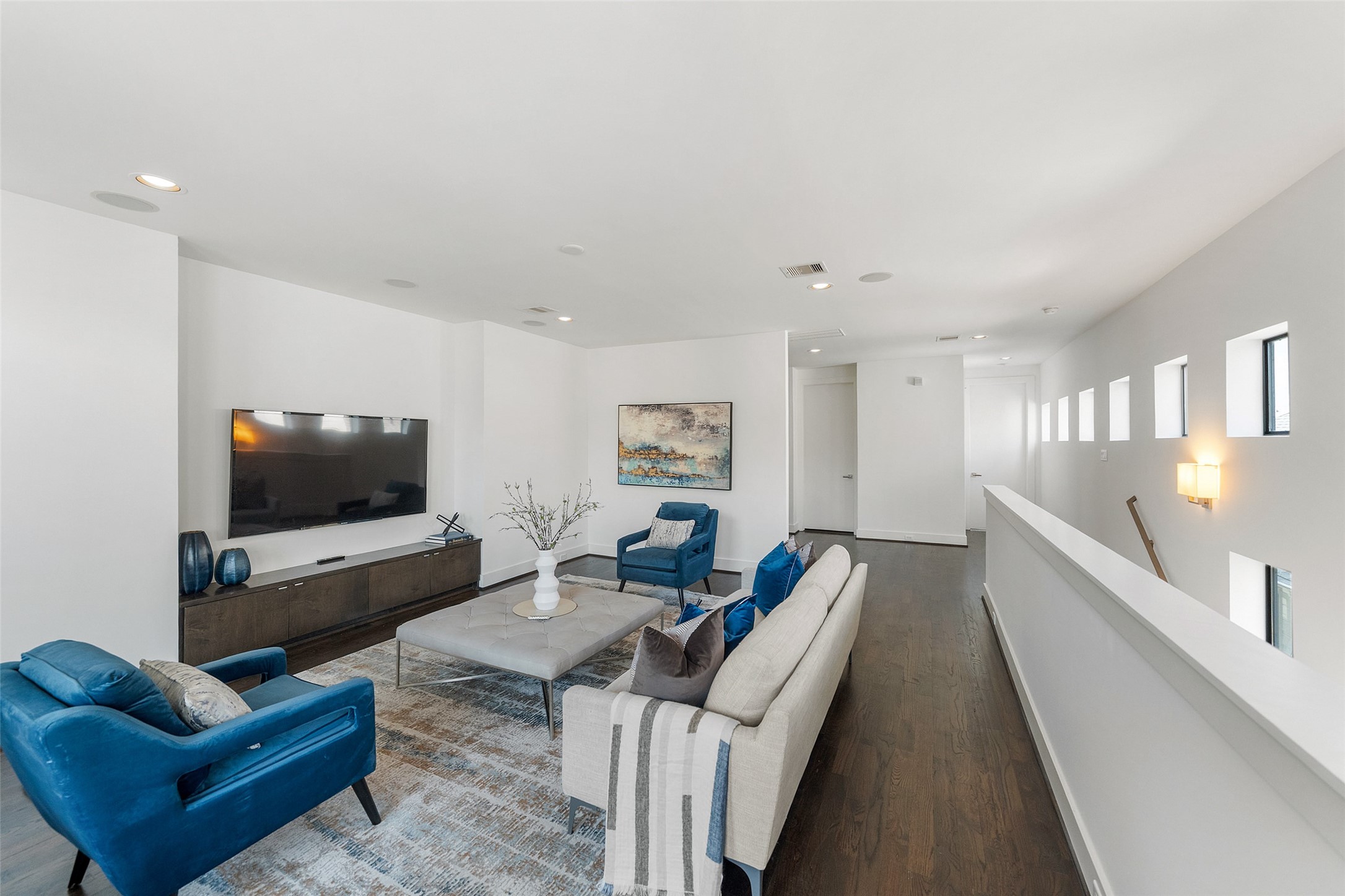 316 Birdsall Street Houston, TX 77007 - Photo 25 of 30 a living room with furniture and a flat screen tv