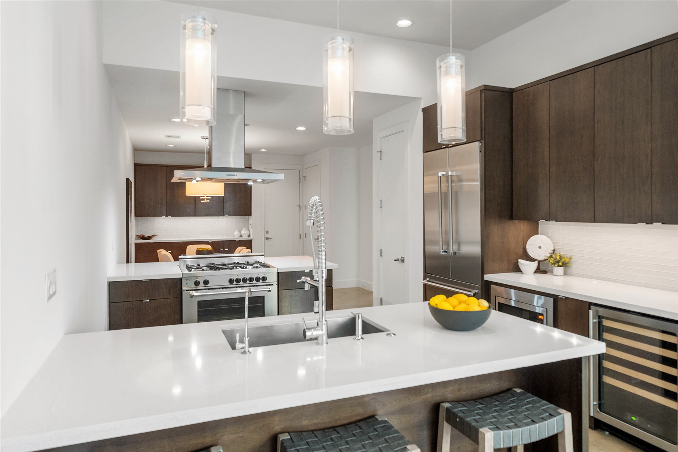 316 Birdsall Street Houston, TX 77007 - Photo 9 of 30 a kitchen with a sink a stove and chairs