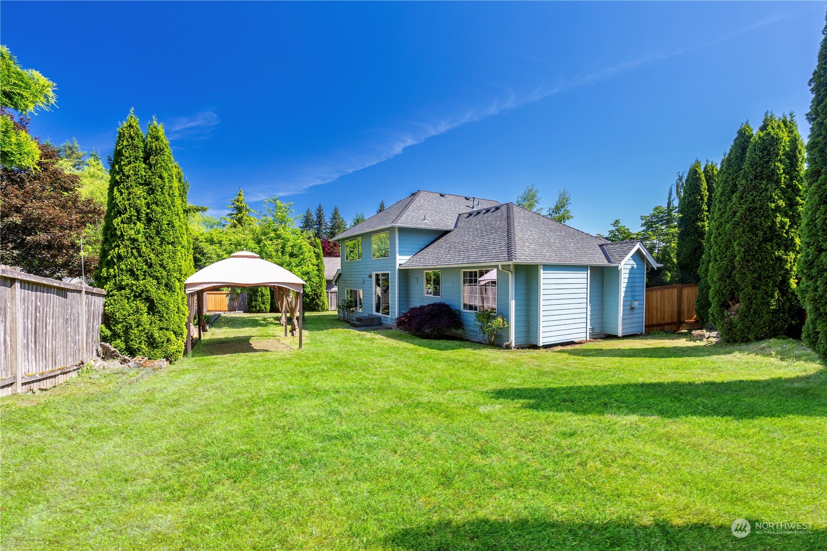 3824 Maple Road Lynnwood, WA 98037 - Photo 3 of 4 a view of a house with a yard and sitting area