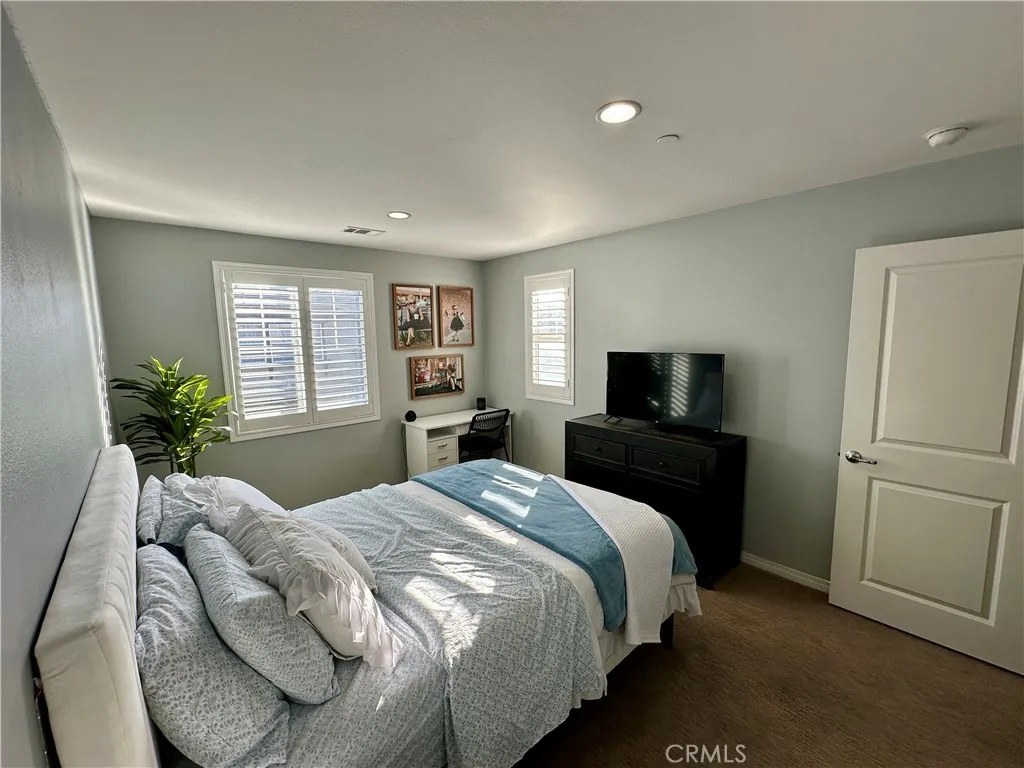 2313 Navigation Yorba Linda, CA 92886 - Photo 27 of 35 a bedroom with a bed and a television