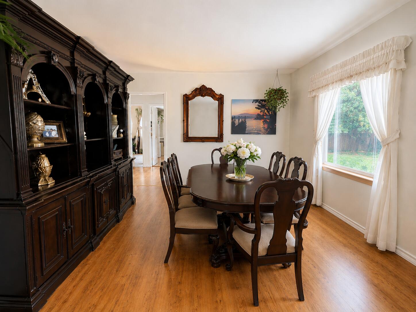 214 South 65th Street Milwaukee, WI 53214 - Photo 12 of 29 Large formal dining room with picture window or could be used as expansion of living room. Some photos may include virtually staging and or digital enhancements.