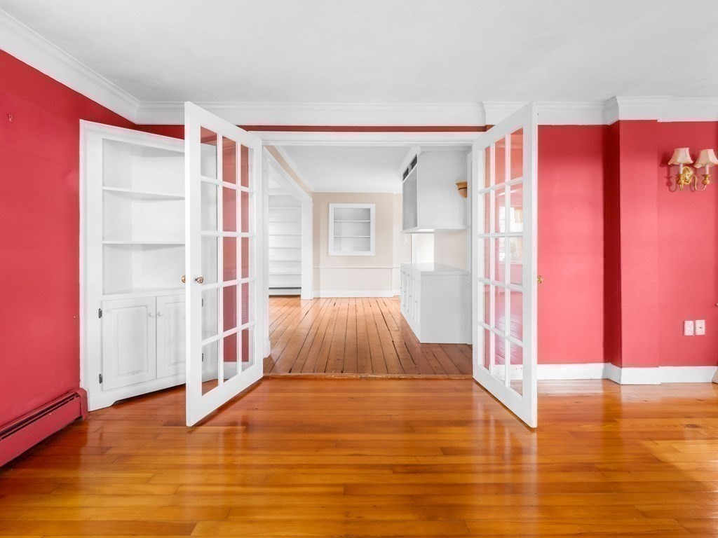 775 Shore Road Bourne, MA 02559 - Photo 24 of 42 a view of livingroom with hardwood floor and front door