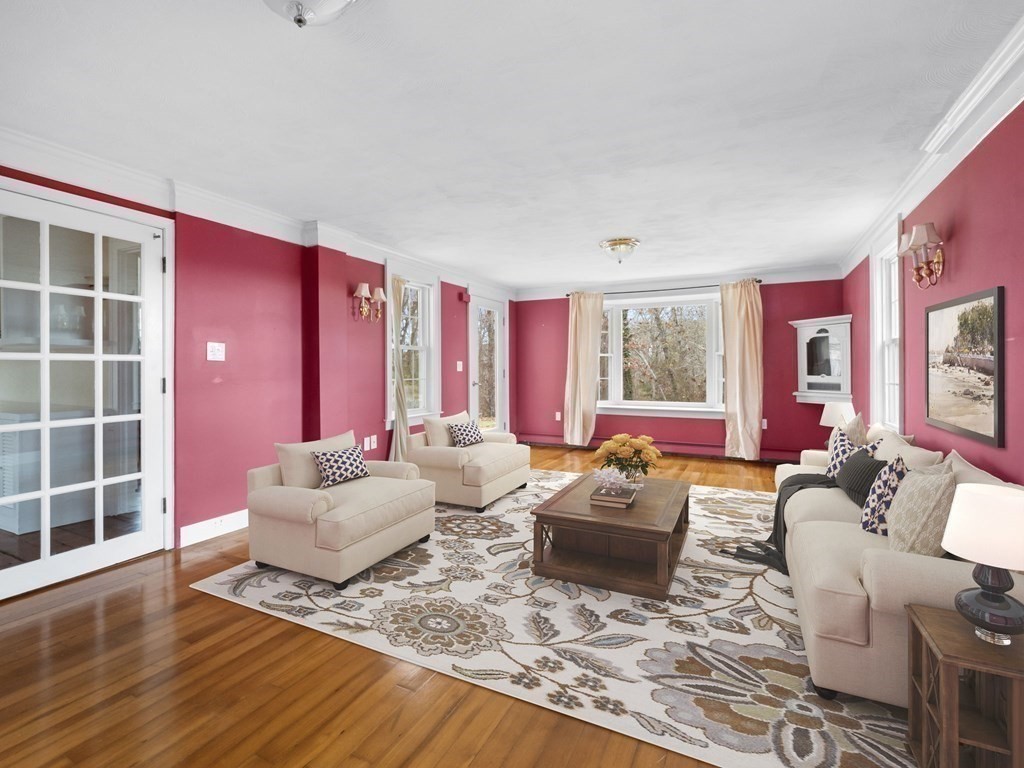 775 Shore Road Bourne, MA 02559 - Photo 26 of 42 a living room with furniture and a window