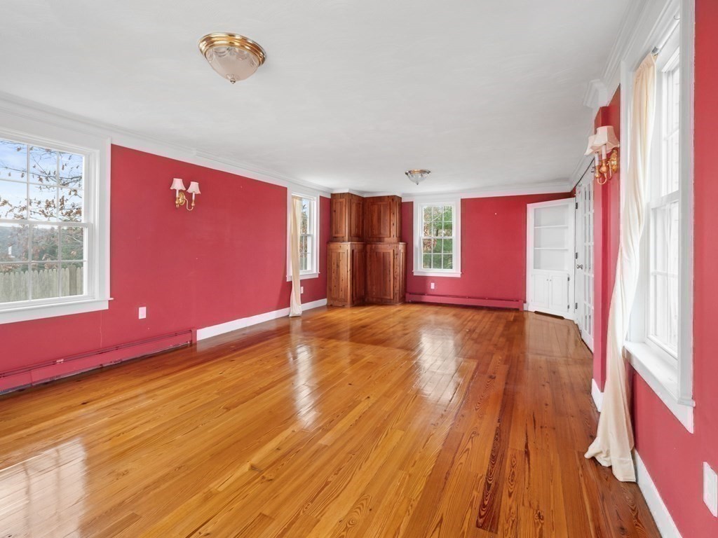 775 Shore Road Bourne, MA 02559 - Photo 27 of 42 a view of empty room with wooden floor