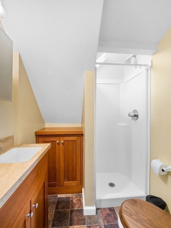 775 Shore Road Bourne, MA 02559 - Photo 29 of 42 a bathroom with a shower and a sink