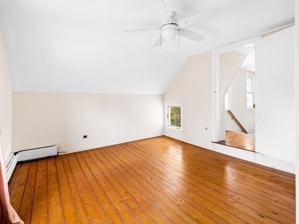 775 Shore Road Bourne, MA 02559 - Photo 31 of 42 wooden floor in an empty room