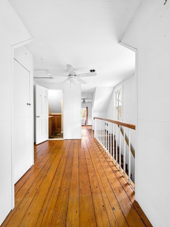 775 Shore Road Bourne, MA 02559 - Photo 33 of 42 a view of gallery with wooden floor